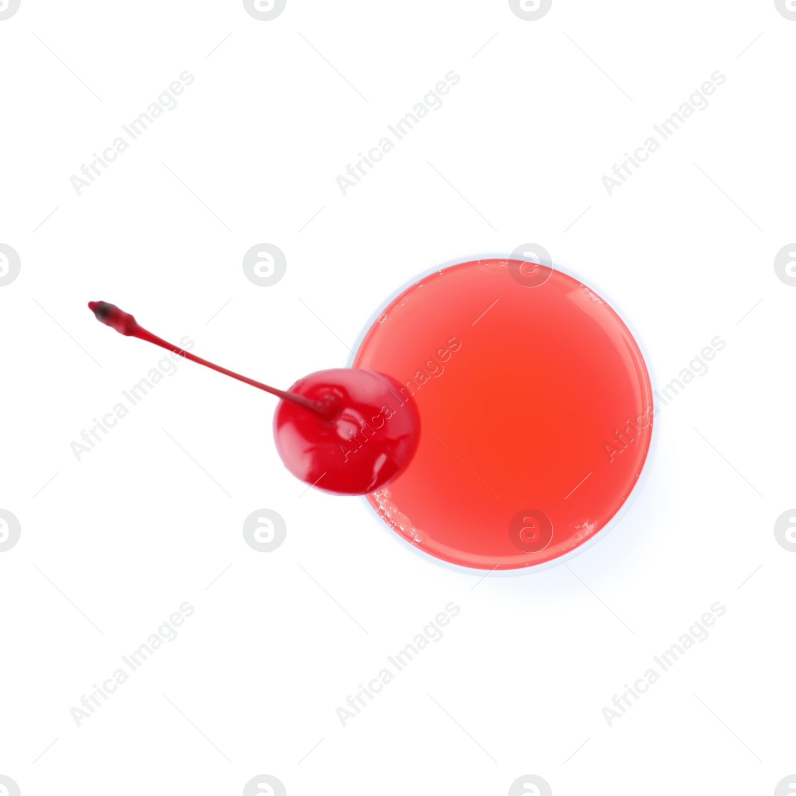 Photo of Glass of Cherry Blossom cocktail on white background, top view. Traditional alcoholic drink