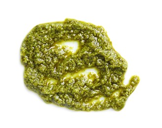 Photo of Sample of tasty pesto sauce isolated on white, top view