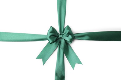 Green satin ribbon with bow isolated on white, top view