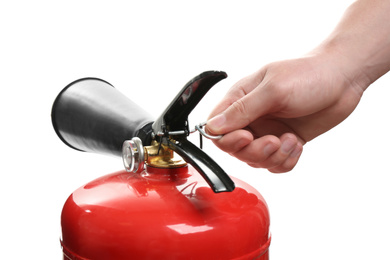 Photo of Man using fire extinguisher on white background, closeup