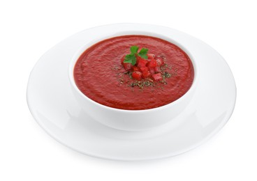 Photo of Delicious tomato cream soup with spices in bowl isolated on white