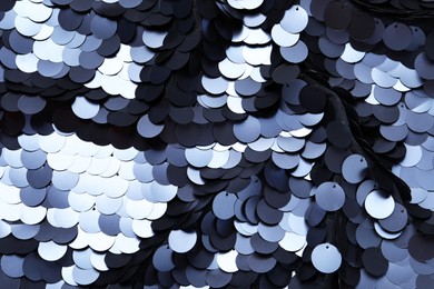 Photo of Beautiful shiny sequin fabric as background, top view