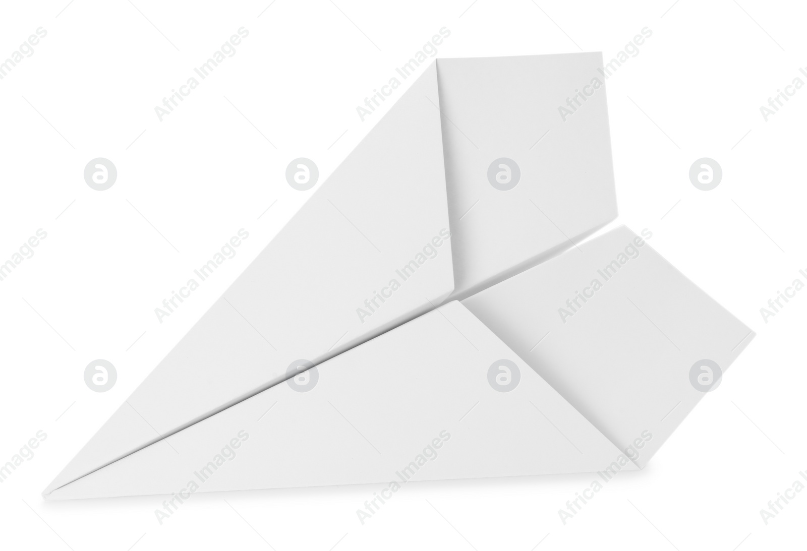 Photo of One handmade paper plane isolated on white