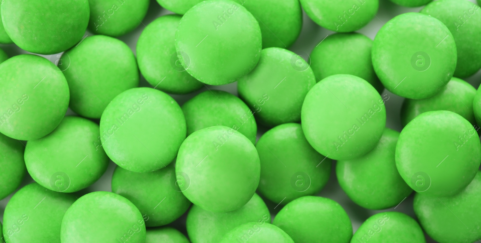 Image of Many colorful candies as background, top view. Banner design 