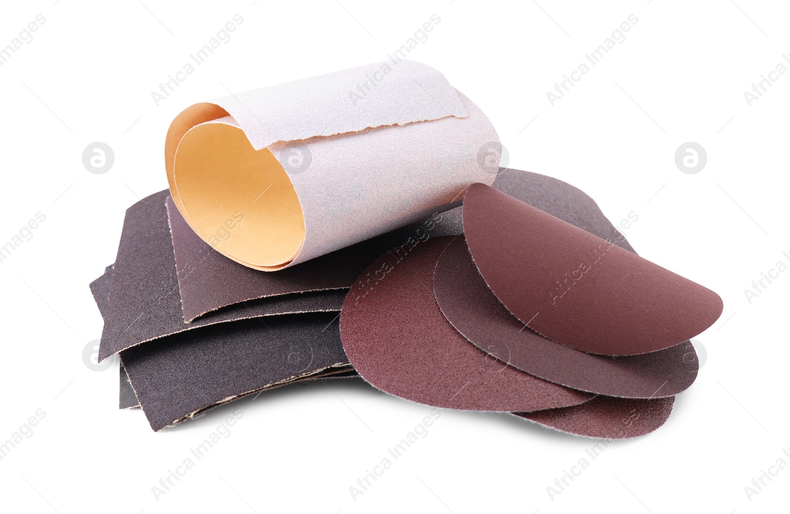 Photo of Many sheets of sandpaper isolated on white