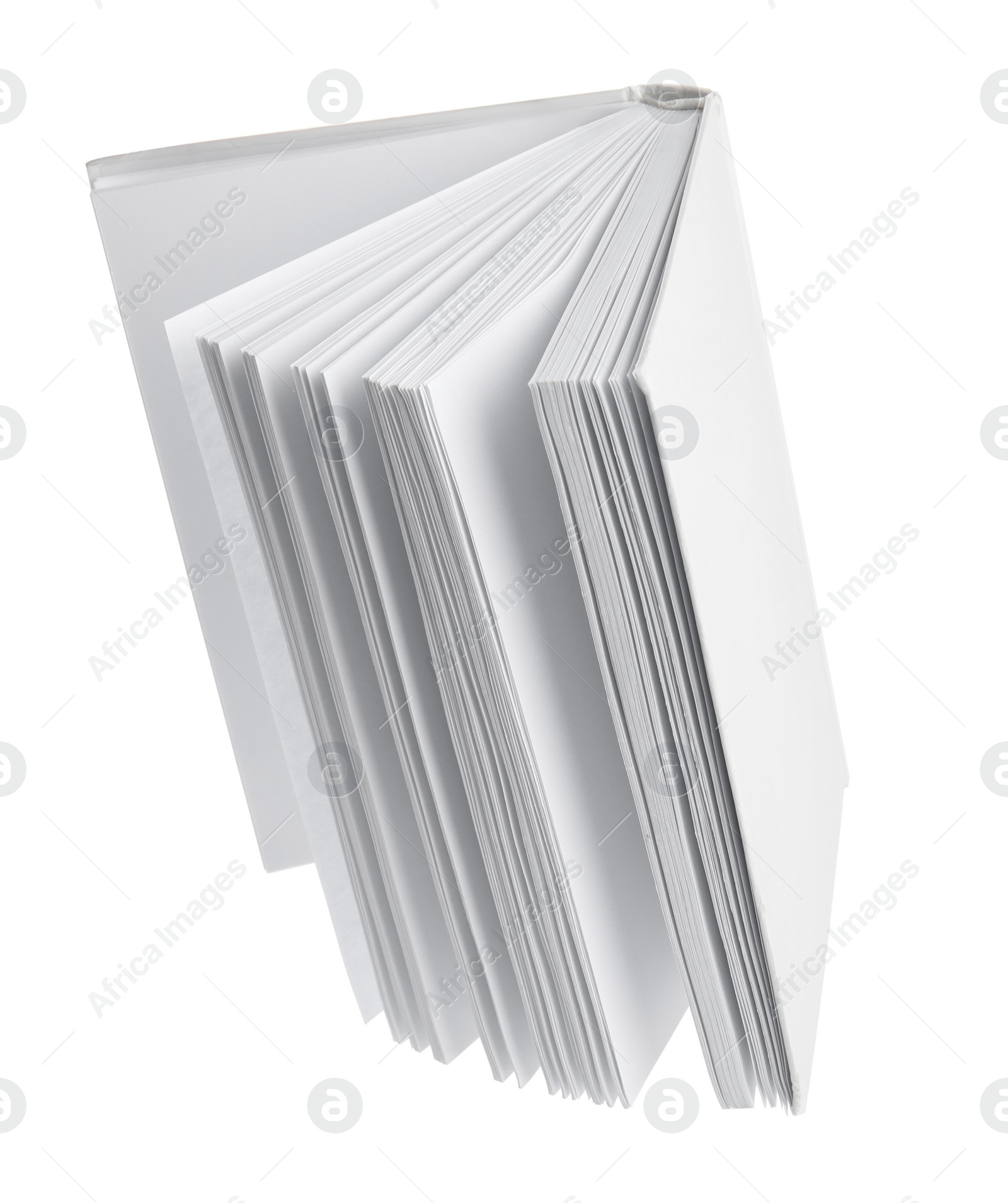 Photo of Open used hardcover book isolated on white