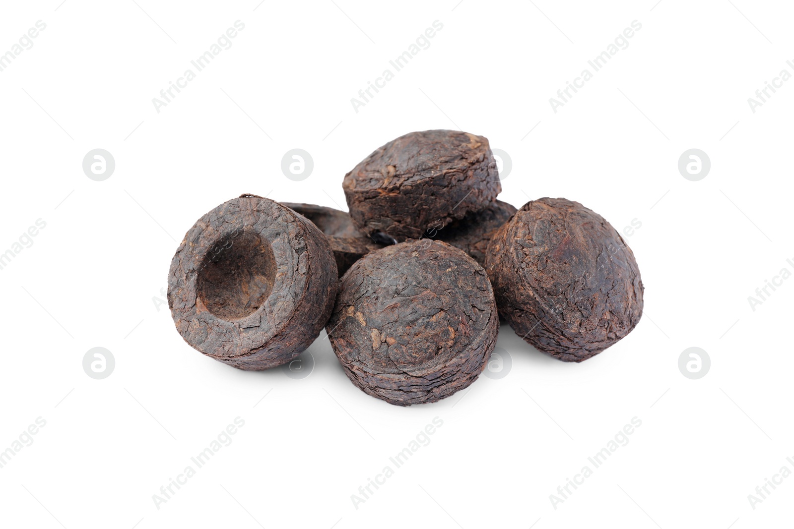 Photo of Cake shaped traditional Chinese pu-erh tea isolated on white