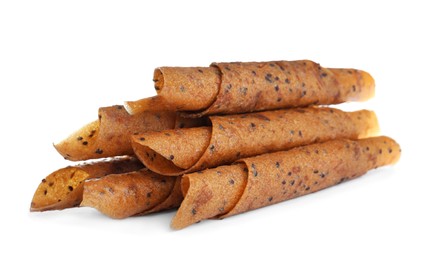 Photo of Delicious fruit leather rolls on white background