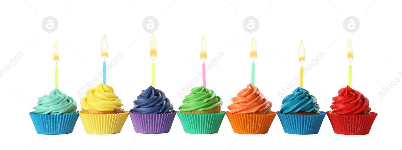 Photo of Delicious birthday cupcakes with candles isolated on white