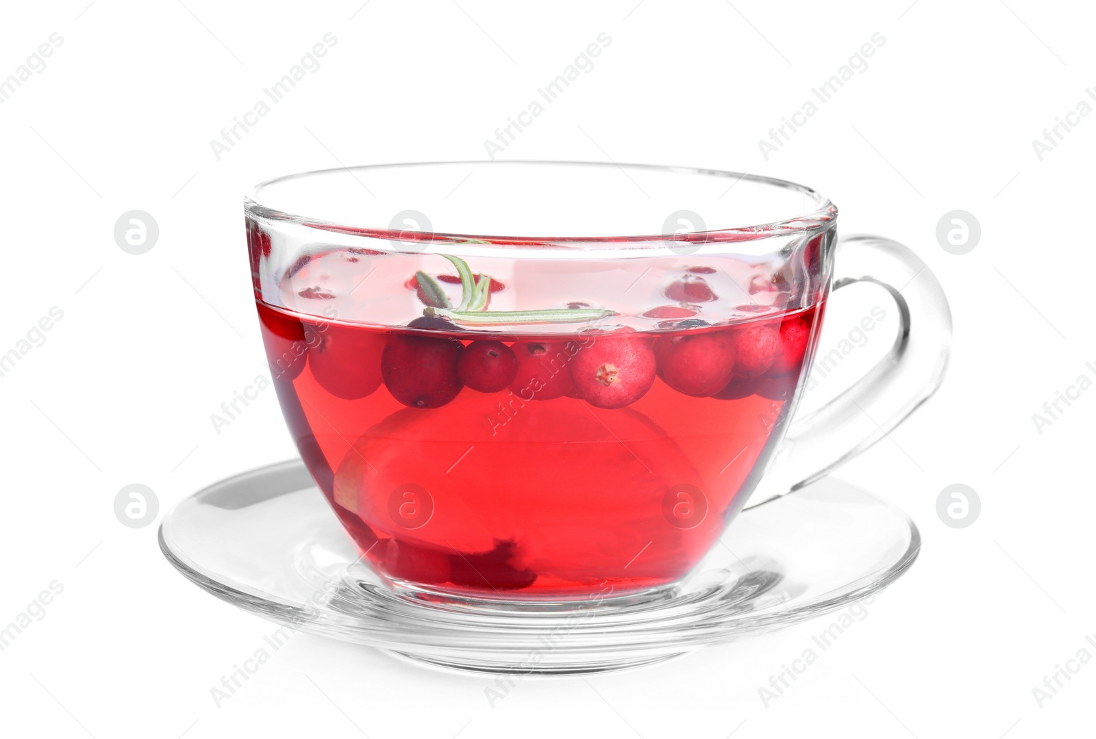 Photo of Tasty hot cranberry tea with rosemary and lemon in glass cup isolated on white