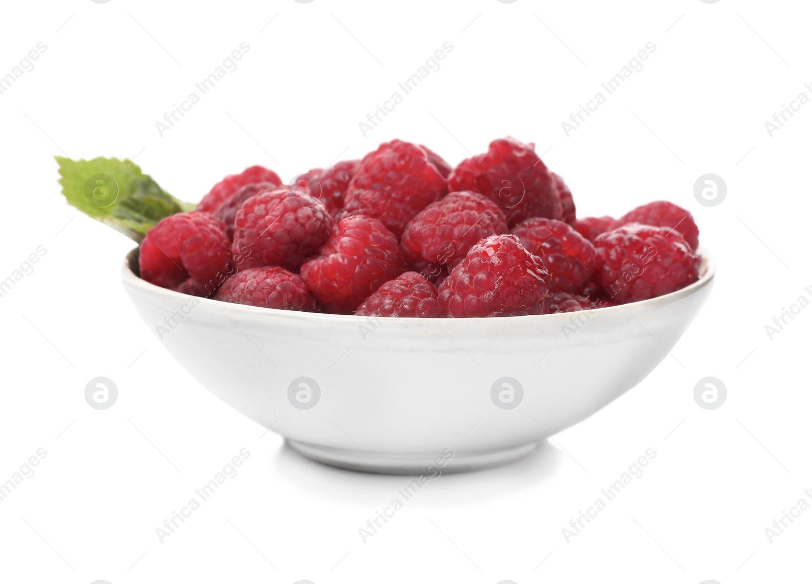 Photo of Plate with ripe raspberries on white background