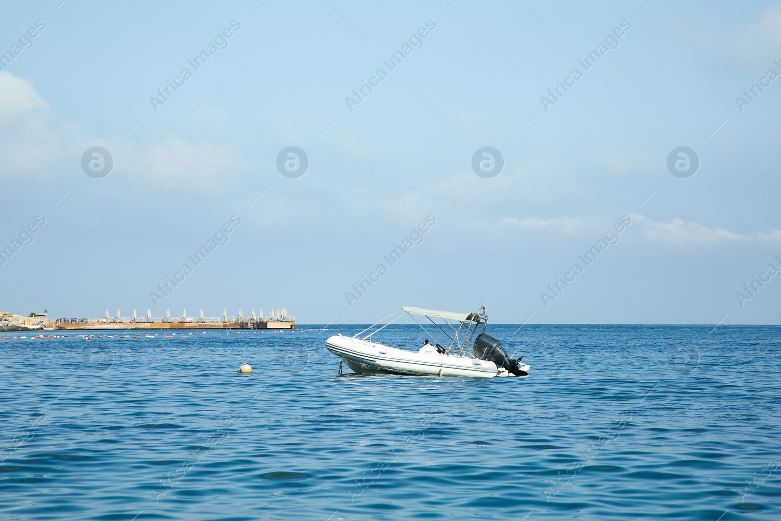 Photo of Inflatable boat on sea under blue sky