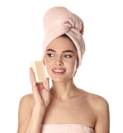 Photo of Young woman with soap bar on white background