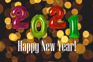 Image of Festive balloons on blurred background, bokeh effect. Happy New Year