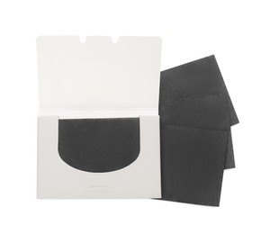 Package with facial oil blotting tissues on white background, top view. Mattifying wipes