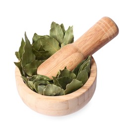 Photo of Wooden mortar with aromatic bay leaves and pestle isolated on white