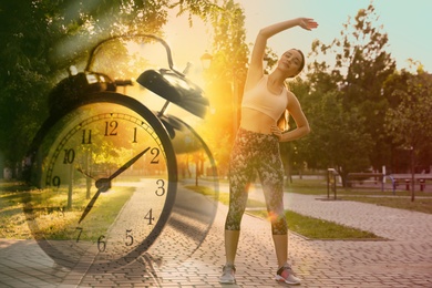 Image of Workout time. Double exposure of woman doing exercise on sunny morning in park and alarm clock