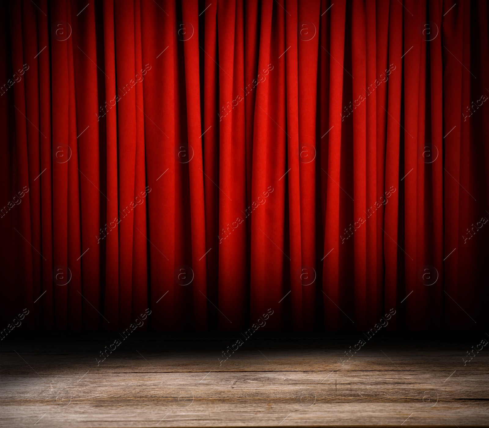 Image of Empty wooden stage and closed red curtains