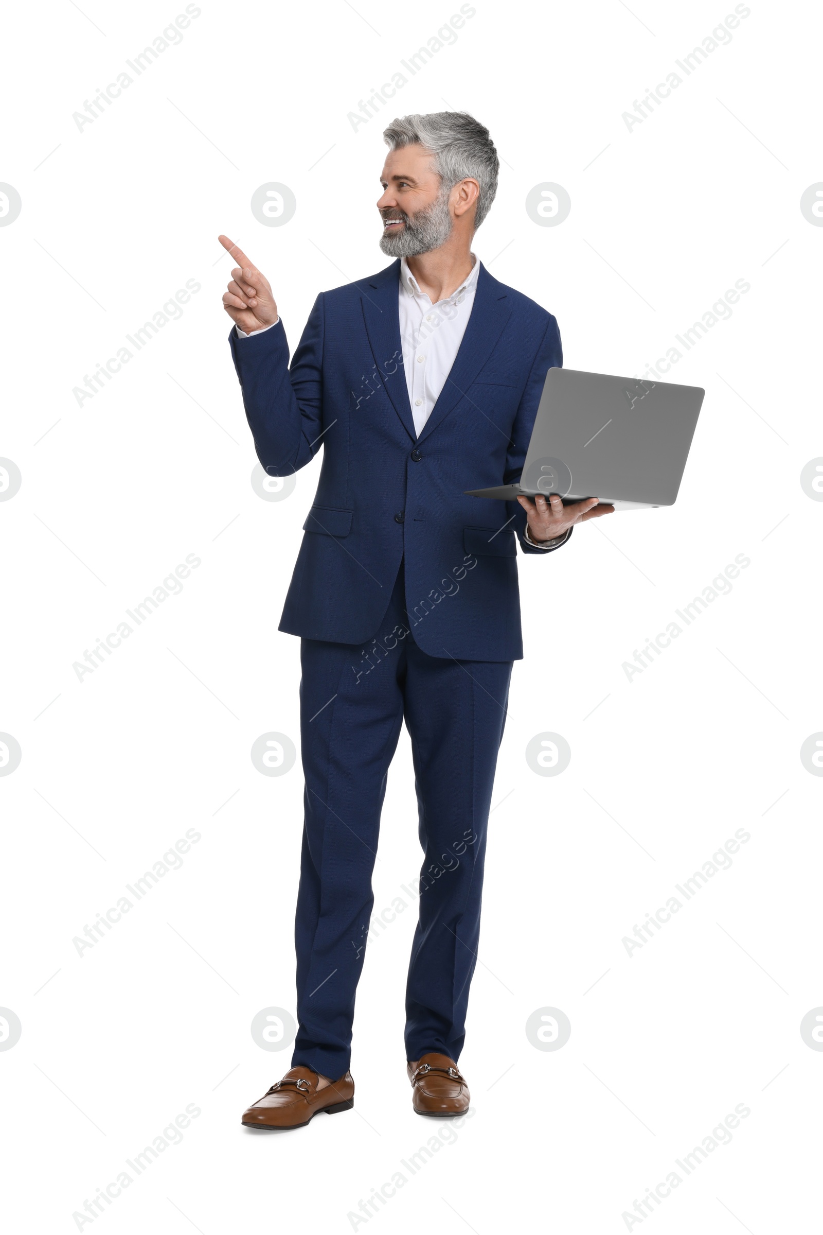 Photo of Mature businessman in stylish clothes with laptop on white background