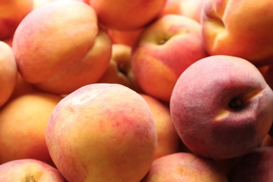 Photo of Fresh ripe peaches as background, closeup view