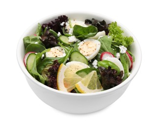 Photo of Delicious salad with boiled eggs, vegetables and lemon in bowl isolated on white