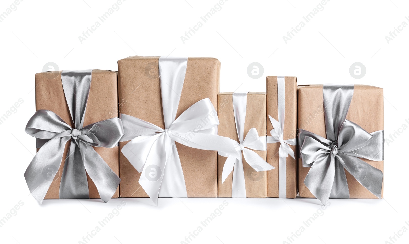 Photo of Beautifully wrapped gift boxes on white background