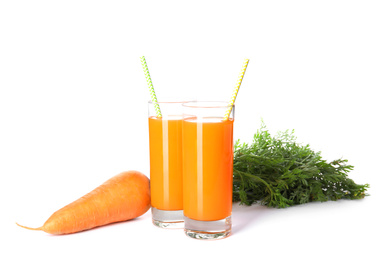 Photo of Freshly made carrot juice on white background