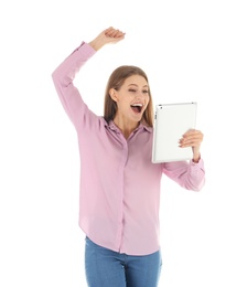 Emotional young woman with tablet celebrating victory on white background