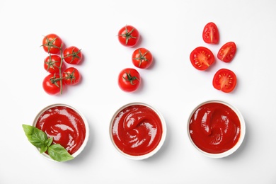 Composition with tasty homemade tomato sauce on white background, top view