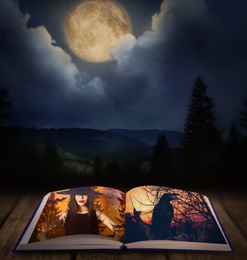 Image of Fantasy world. Open book of fairytales with witch and black crow on pages