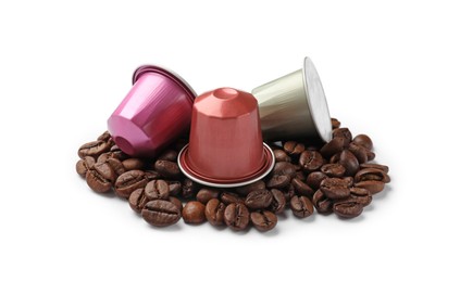 Many coffee capsules and beans isolated on white