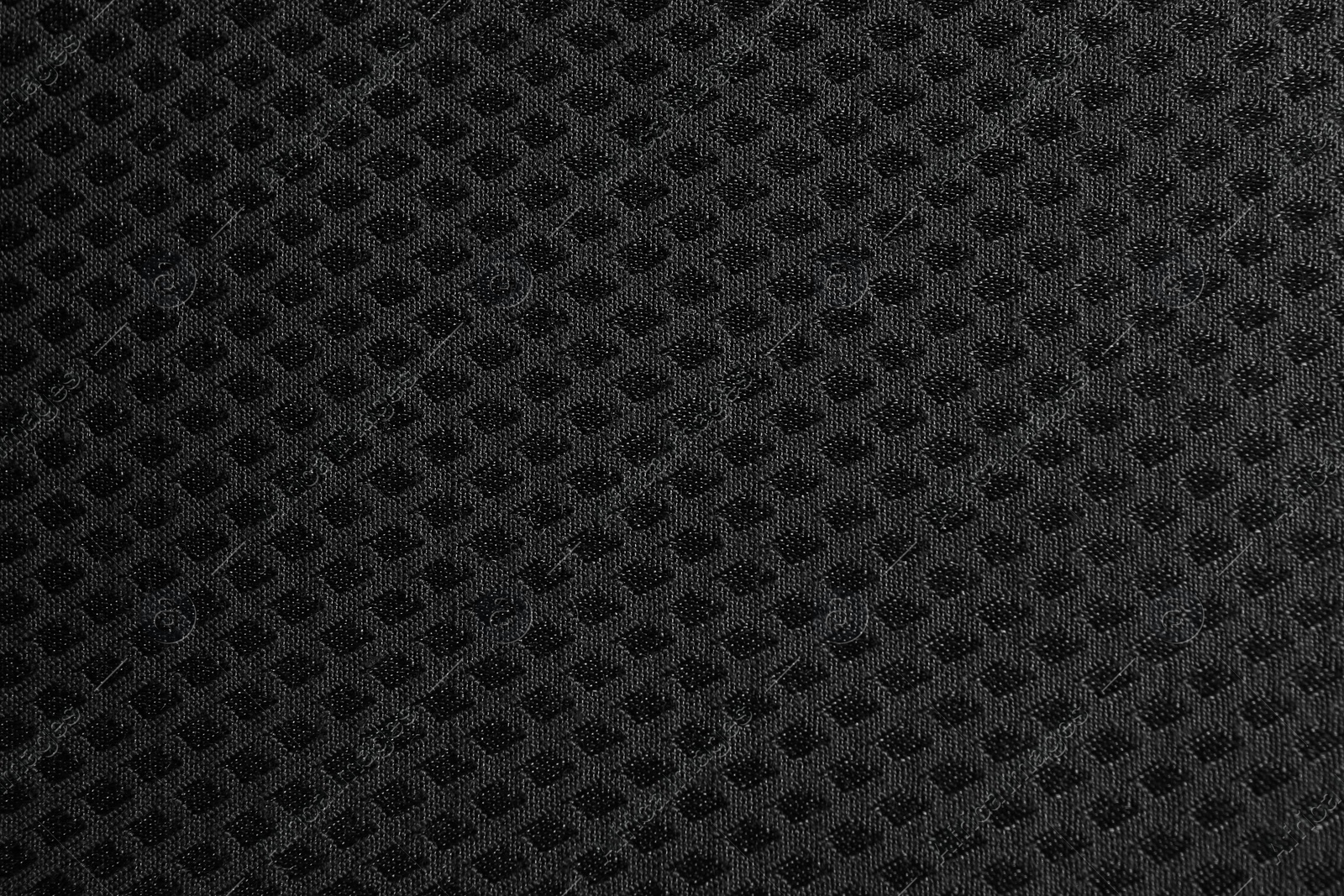 Photo of Textured black fabric as background, closeup view