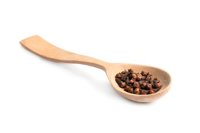 Photo of Wooden spoon with aromatic dry cloves isolated on white