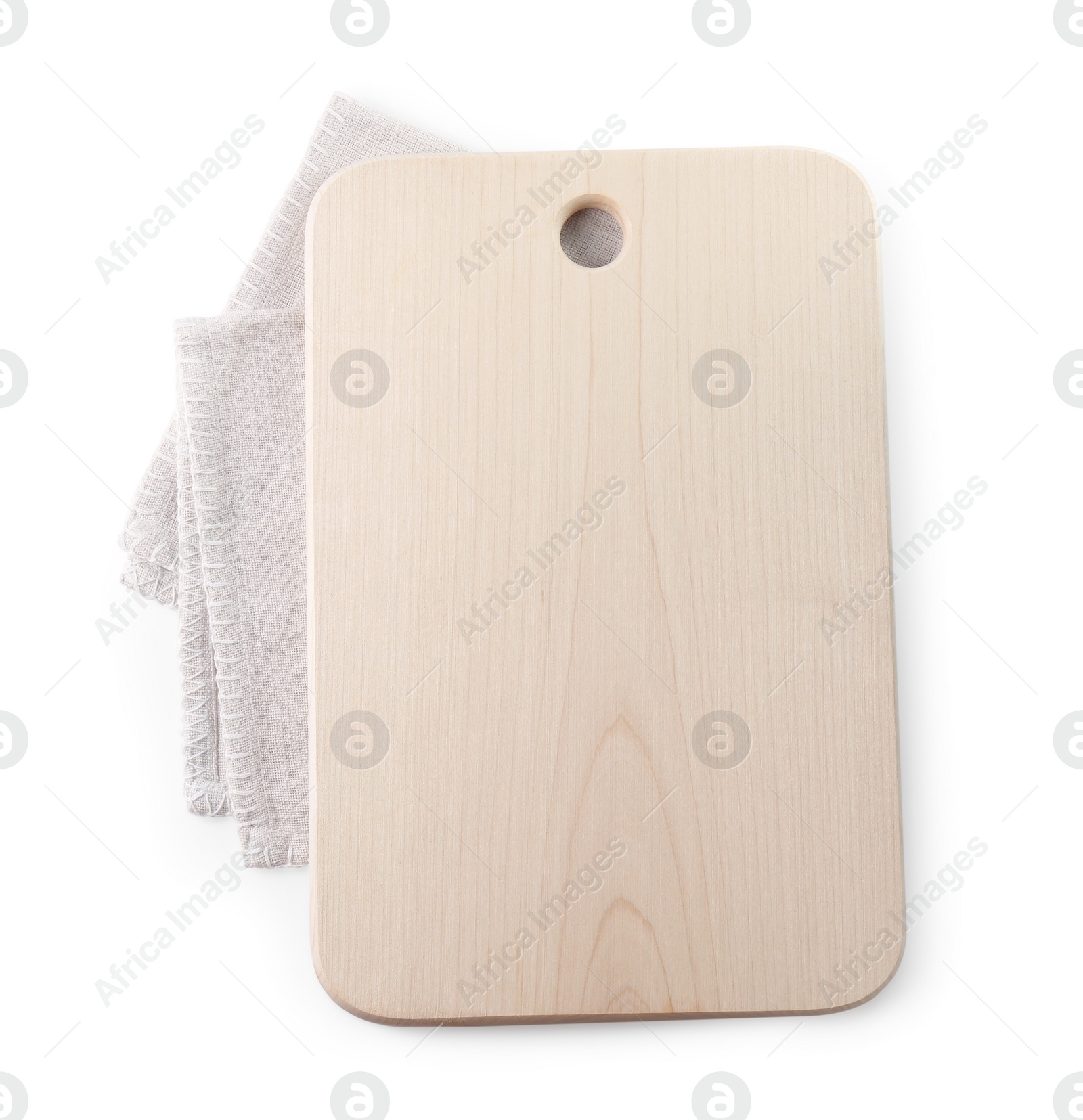 Photo of Wooden cutting board and kitchen towel isolated on white, top view