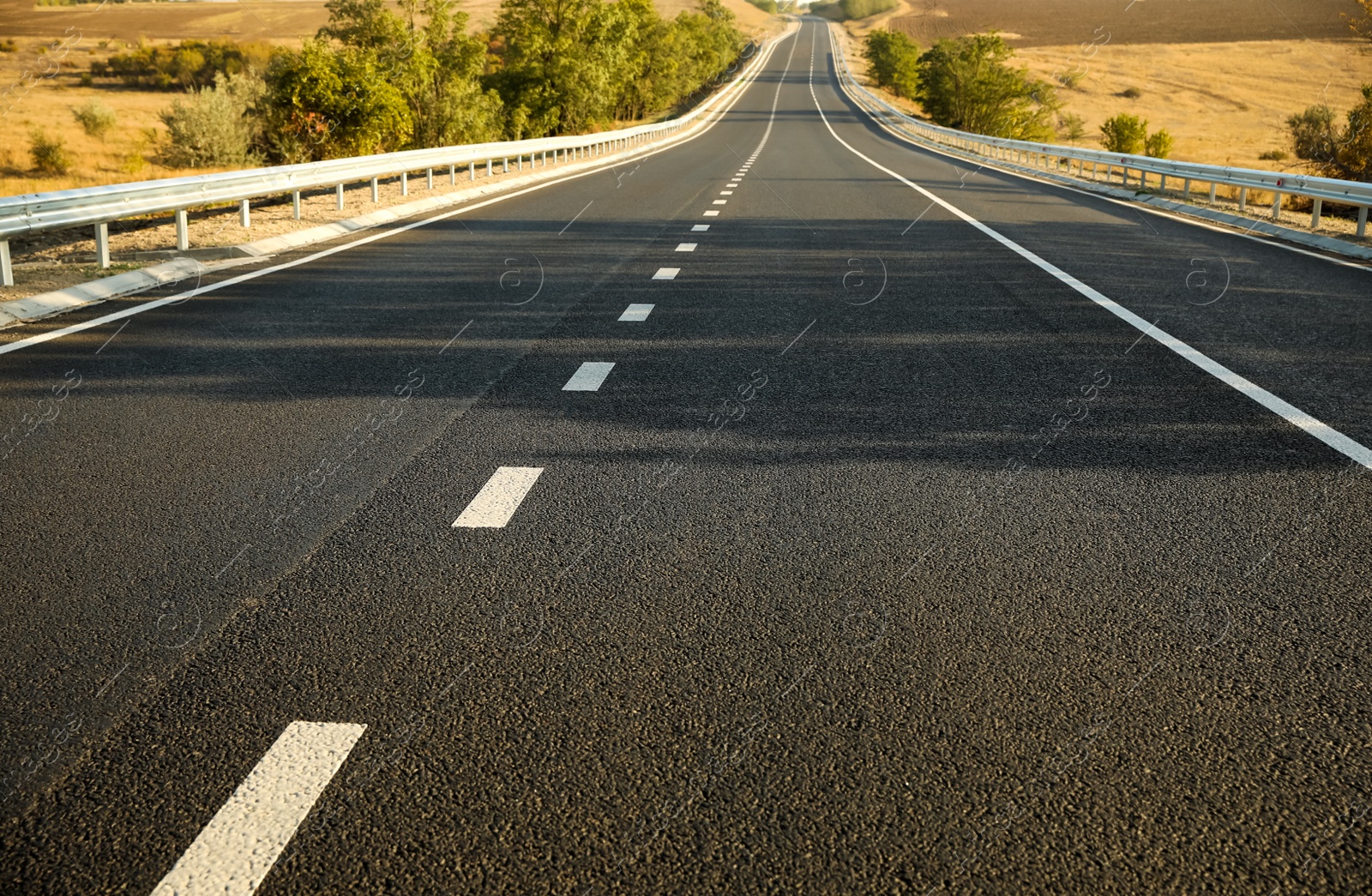 Photo of Beautiful view of empty asphalt highway. Road trip