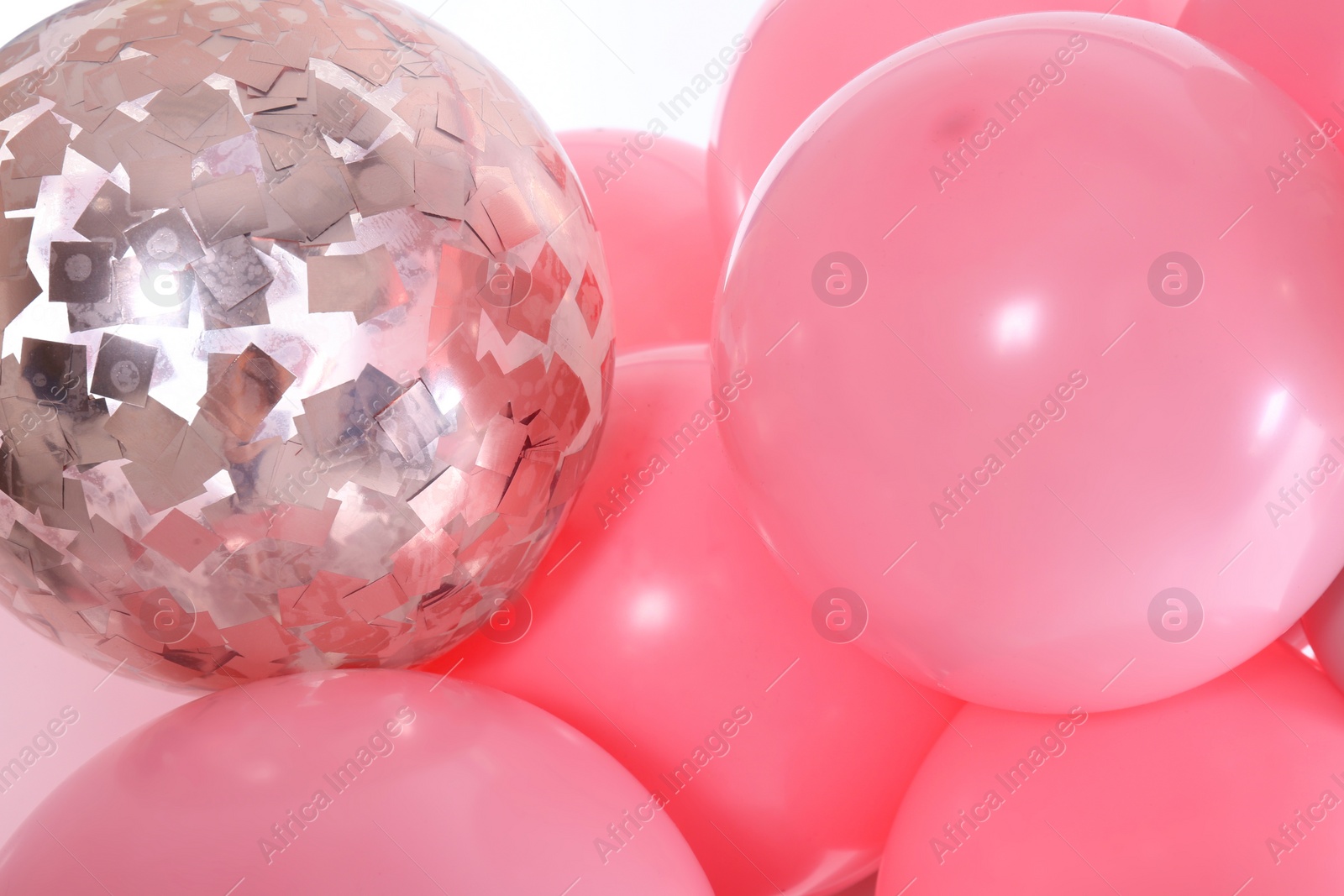 Photo of Beautiful colorful balloons on white background, closeup