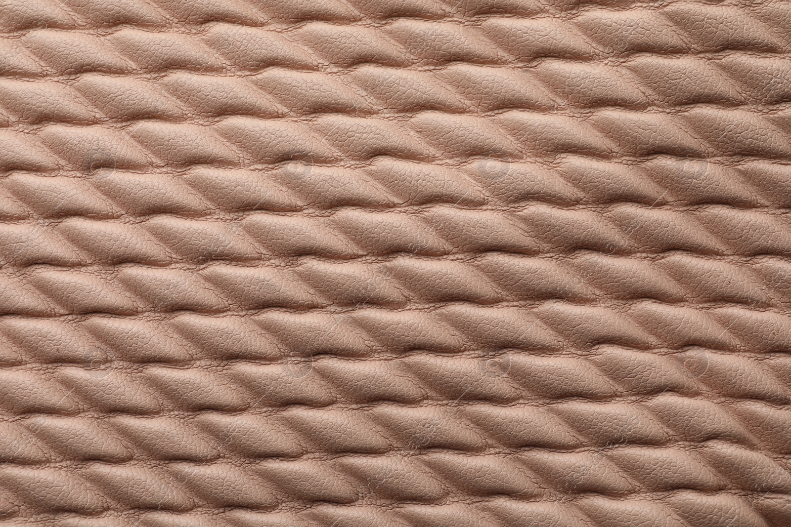 Photo of Texture of brown leather as background, closeup