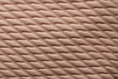 Texture of brown leather as background, closeup