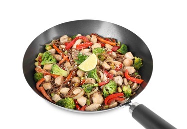 Photo of Stir-fry. Tasty noodles with meat and vegetables in wok isolated on white