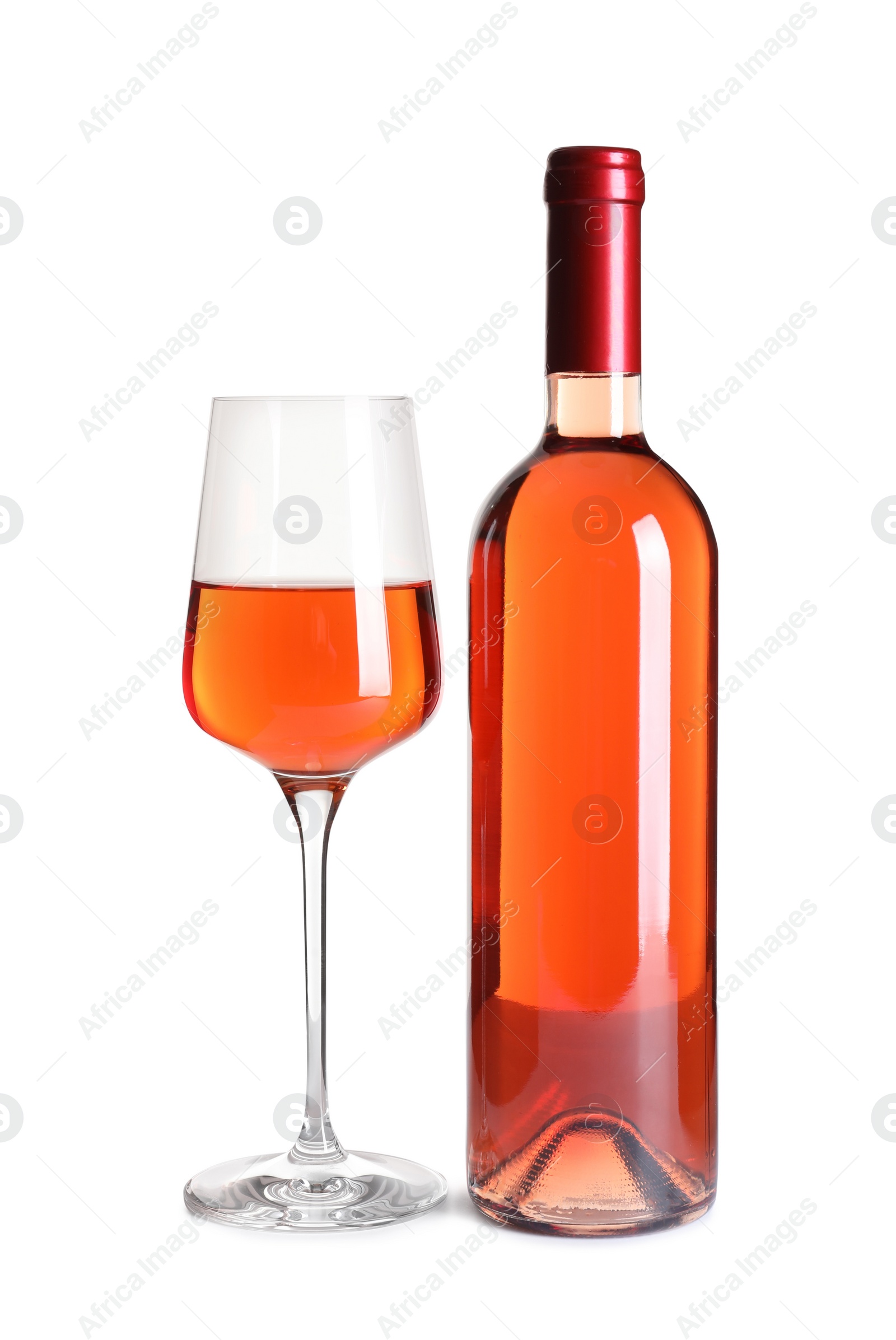 Photo of Glass and bottle of delicious wine on white background