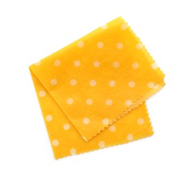 Photo of Yellow reusable beeswax food wrap on white background, top view