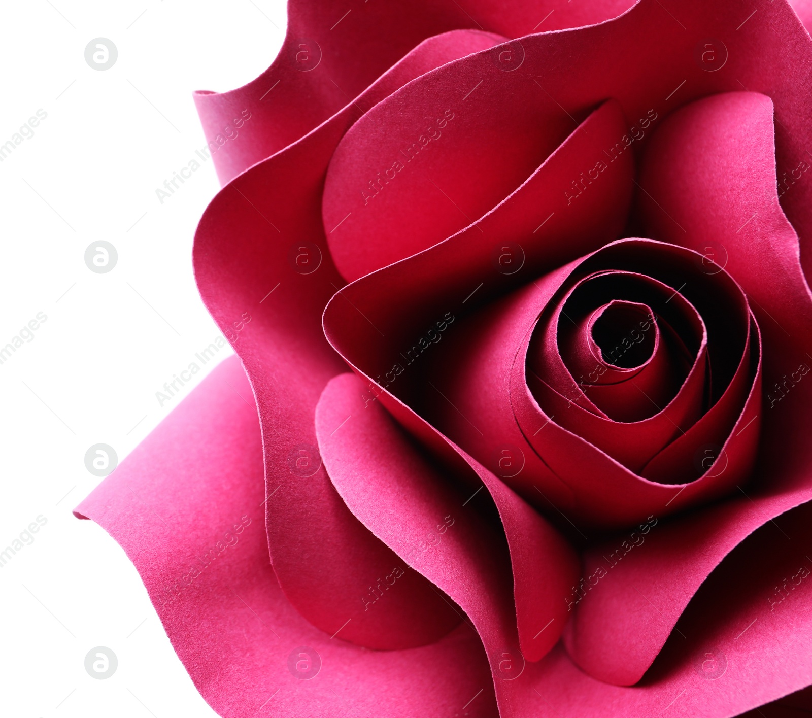 Photo of Beautiful red flower made of paper on white background, top view