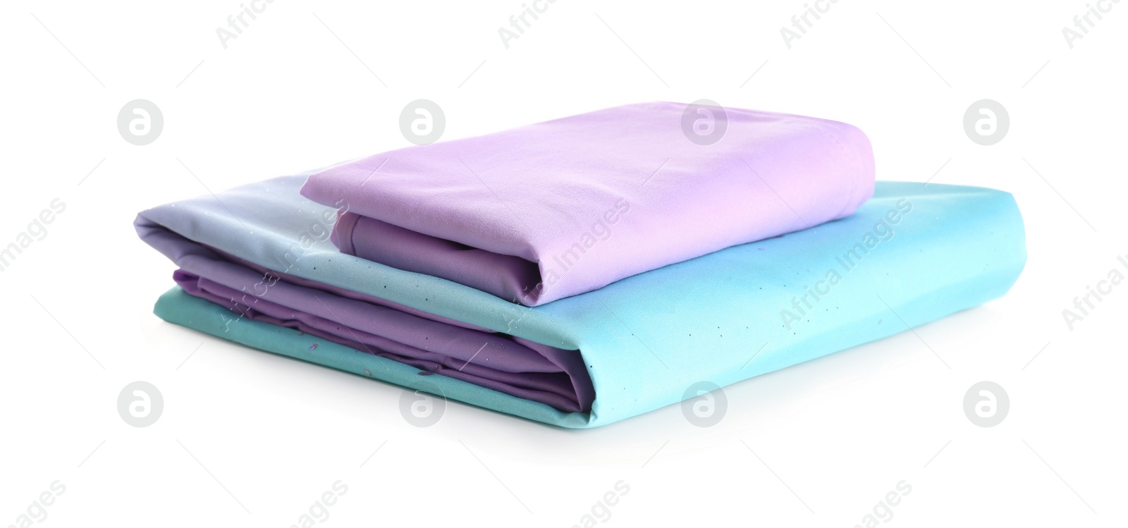 Photo of Stack of clean bed sheets isolated on white