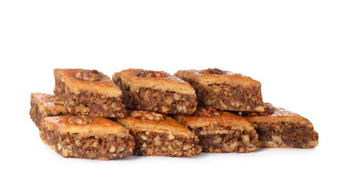 Delicious honey baklava with walnuts on white background