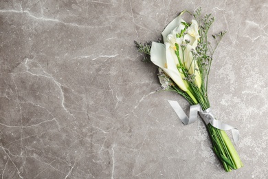 Photo of Bouquet of beautiful fragrant flowers on table