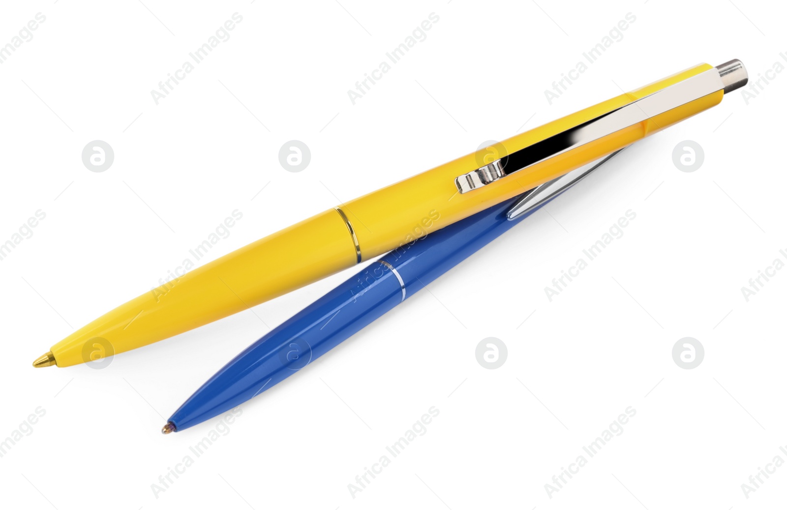 Photo of New stylish blue and yellow pens isolated on white