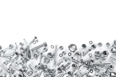 Different metal bolts and nuts on white background, top view