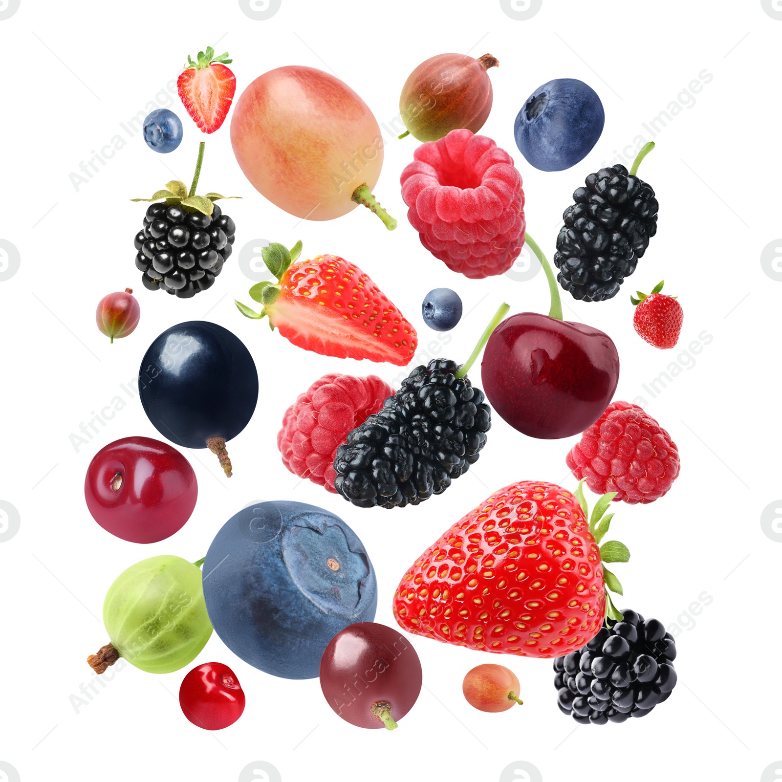 Image of Many different fresh berries falling on white background