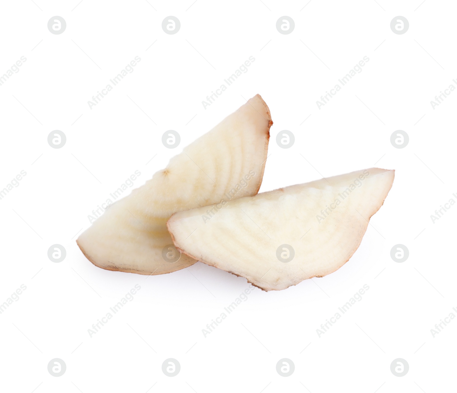 Photo of Pieces of sugar beet on white background