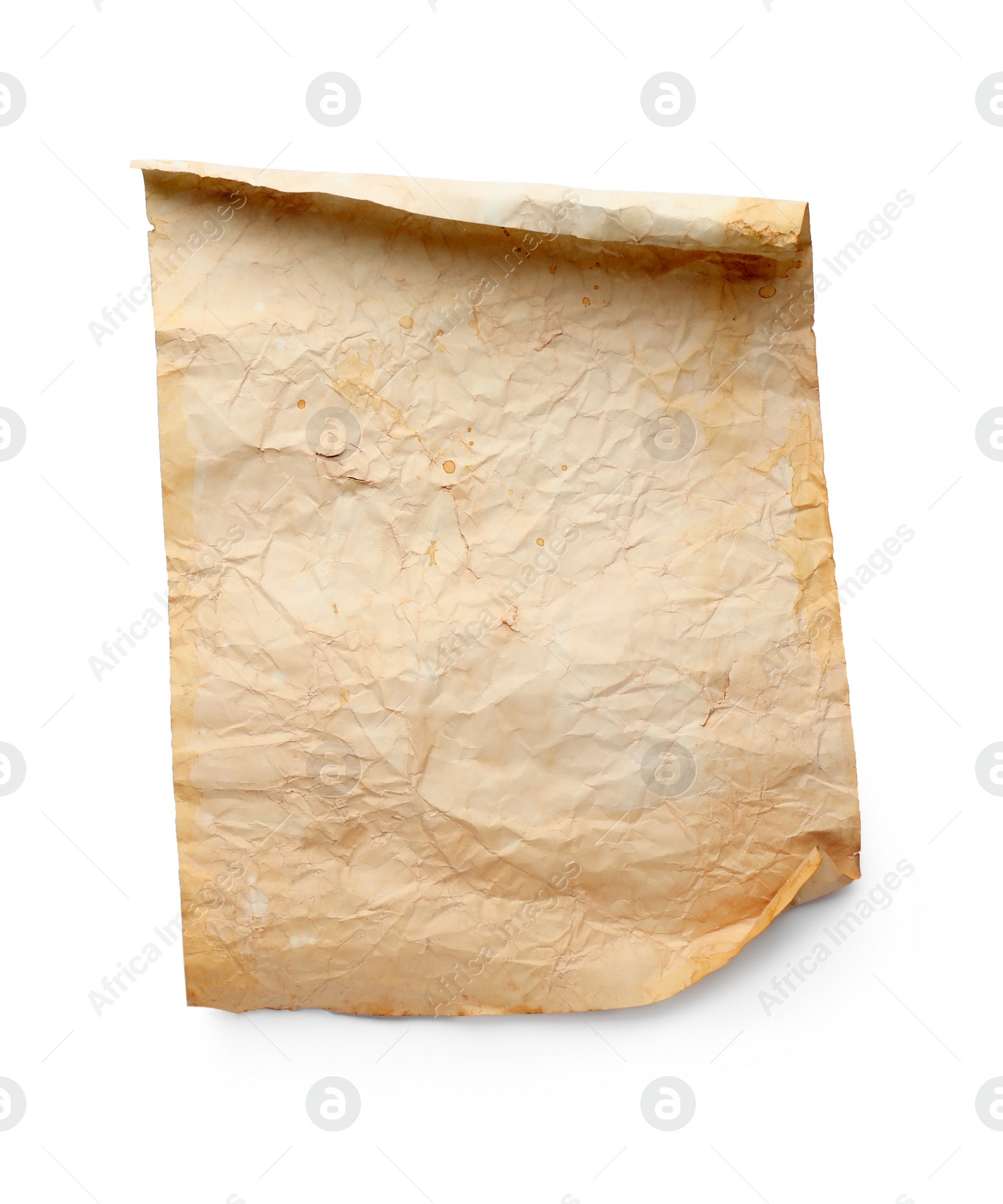 Photo of Sheet of old parchment paper isolated on white, top view. Space for design